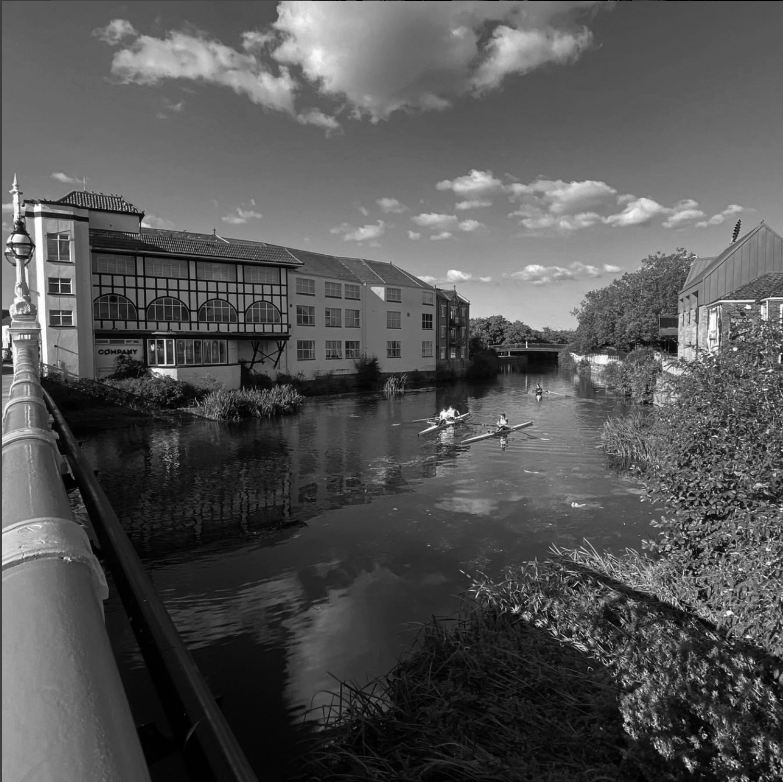 Apple County Cycles location picturesque image of river in greyscale